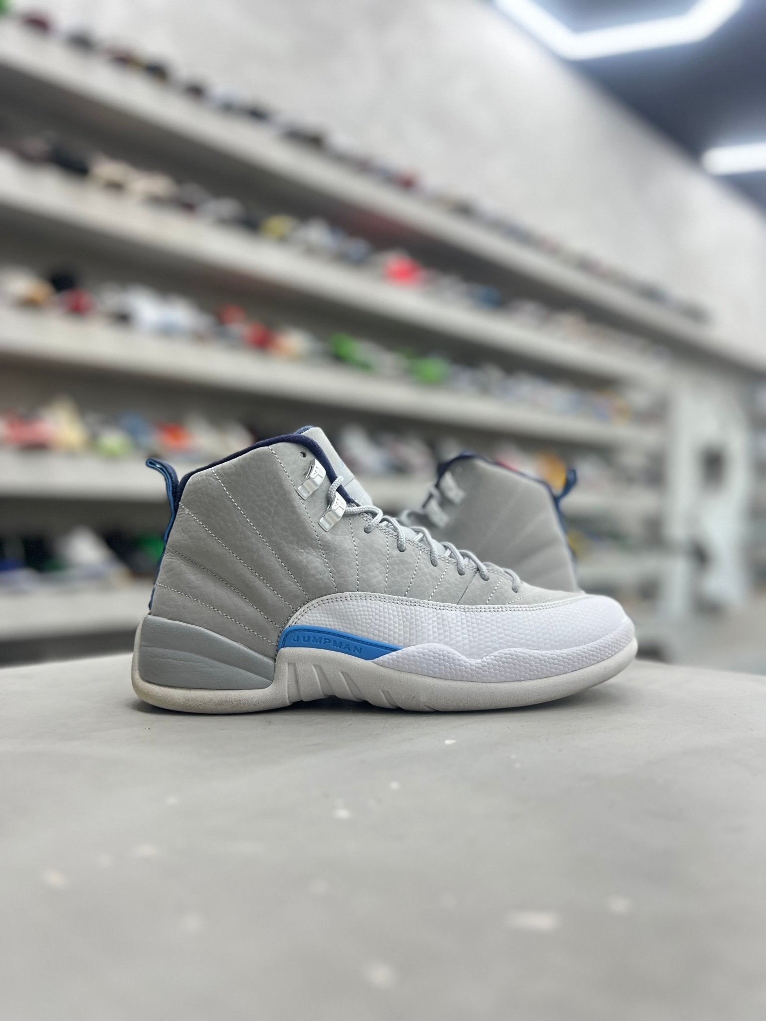 Jordan 12 Retro Grey University Blue Sz 8.5 (PREOWNED)(NO Box) - Restock AveJordan 12 Retro Grey University Blue Sz 8.5 (PREOWNED)(NO Box)Restock AveRestock Ave8.5Restock Ave