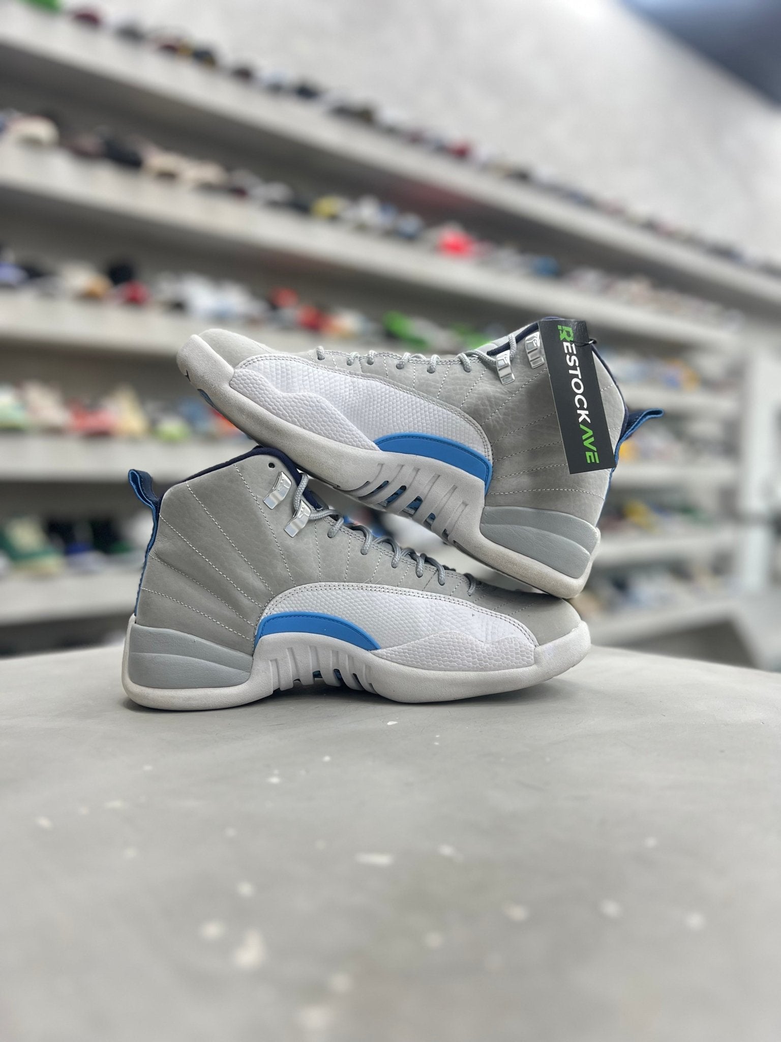 Jordan 12 Retro Grey University Blue Sz 8.5 (PREOWNED)(NO Box) - Restock AveJordan 12 Retro Grey University Blue Sz 8.5 (PREOWNED)(NO Box)Restock AveRestock Ave8.5Restock Ave
