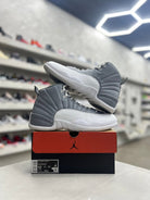 Jordan 12 Retro Stealth Sz 12 (PREOWNED) - Restock AveJordan 12 Retro Stealth Sz 12 (PREOWNED)Restock AveRestock Ave12Restock Ave