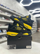 Jordan 4 Retro Thunder Sz 10 (PREOWNED) - Restock AveJordan 4 Retro Thunder Sz 10 (PREOWNED)Restock AveRestock Ave10Restock Ave